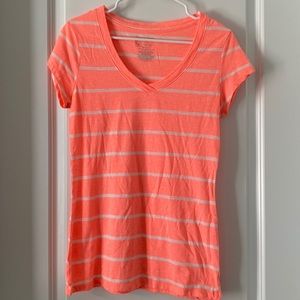 Coral/Orange/Pink with White stripes shirt.